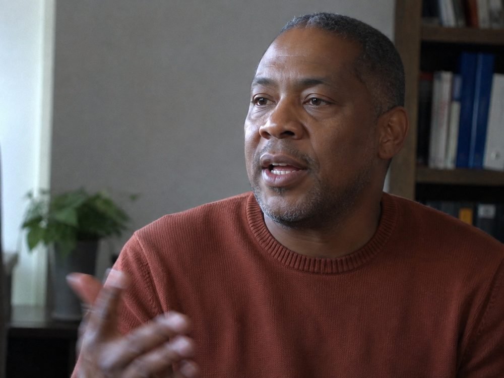 A member telling his story on camera